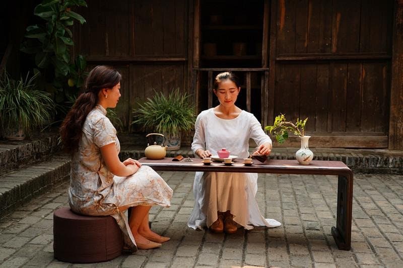 Pu’er Tea — tea shared at a courtyard table