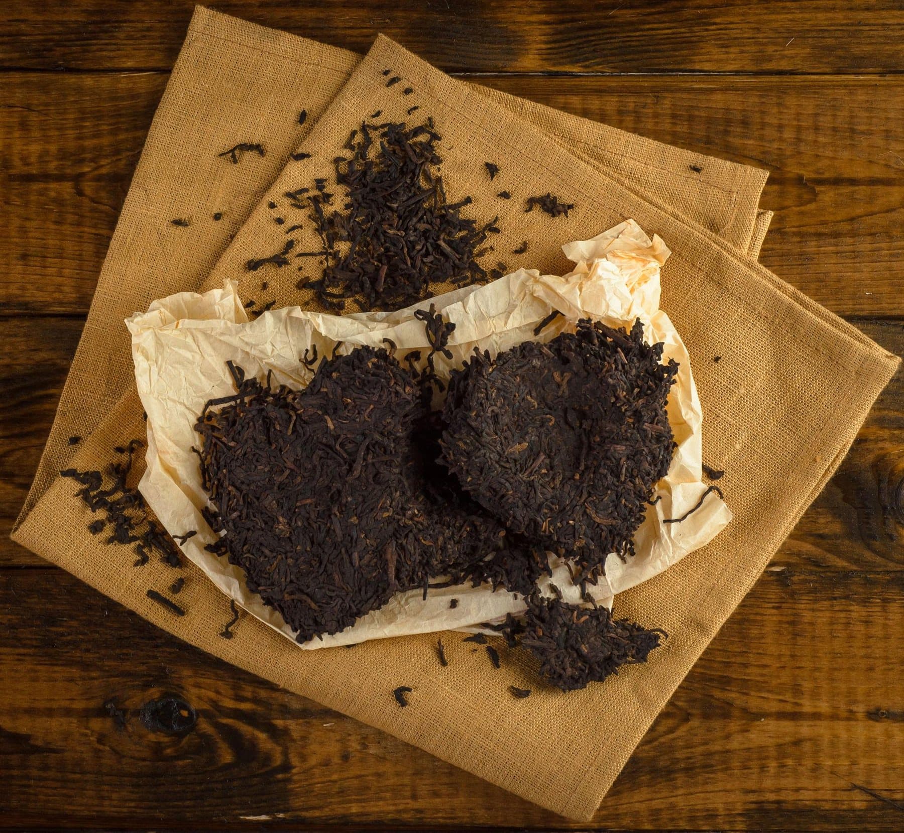 Pu’er Tea — aged Pu’er tea opened on its paper wrapper