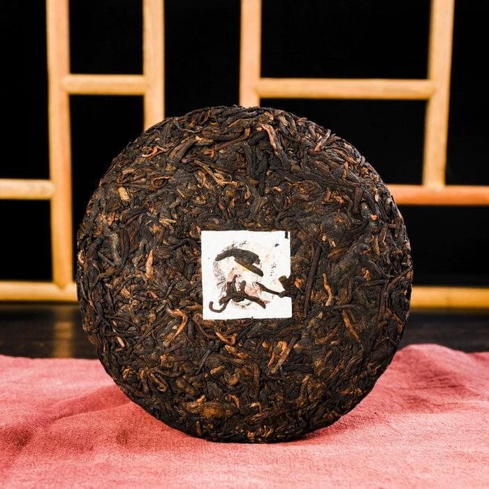 Pu’er Tea — a compressed round cake of Pu’er tea