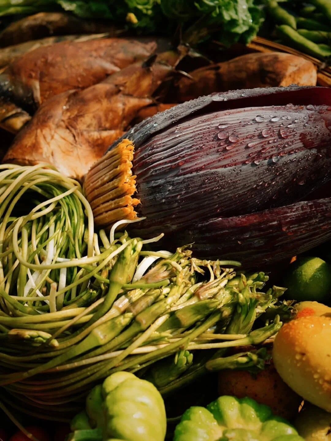 Yunnan Spring Markets — fresh roots and vegetables on a market stall