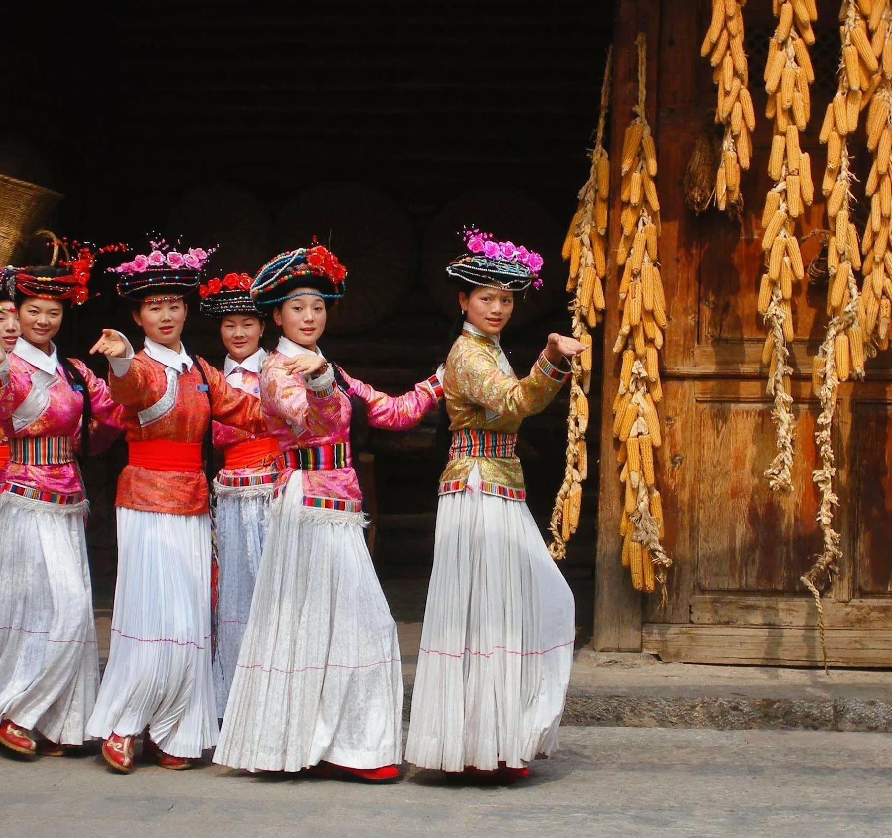 Ethnic Cultures of Yunnan — women in traditional dress in Lijiang