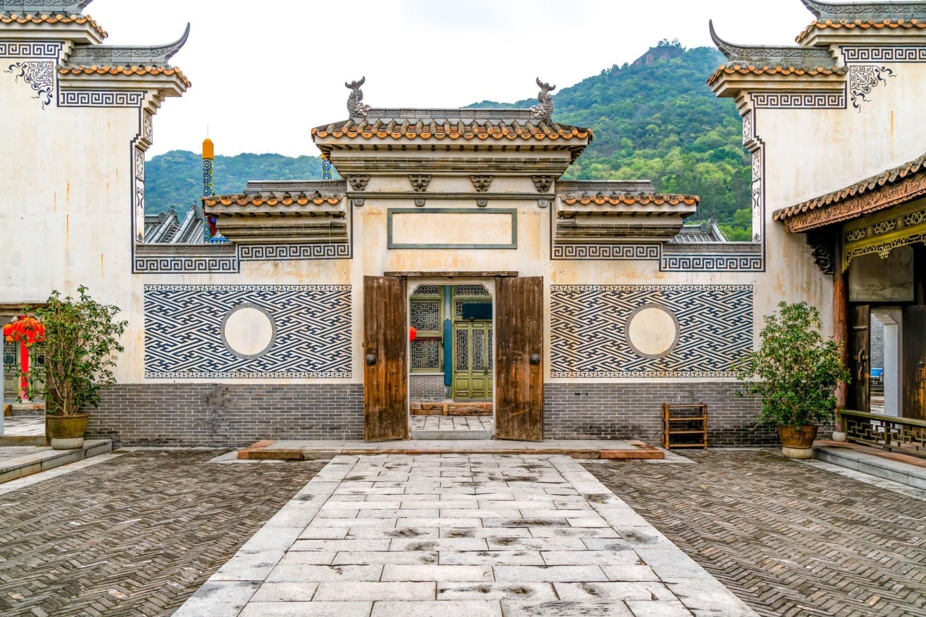 Ethnic Cultures of Yunnan — a white-walled Bai courtyard in Dali