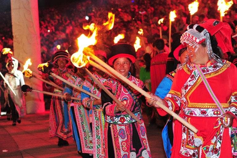 Festivals of Yunnan — Yi performers carrying torches