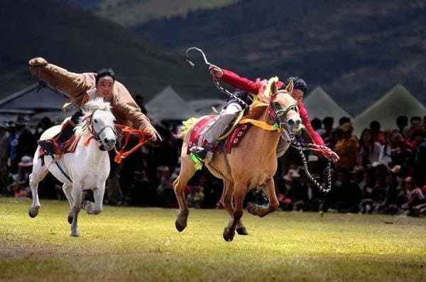 Festivals of Yunnan — riders racing across the Tibetan plateau
