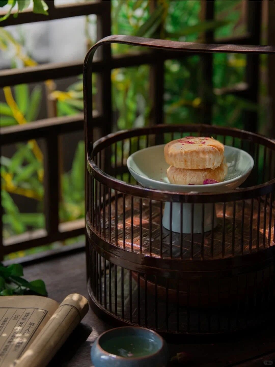 Yunnan Flower Pastry — a baked flower pastry resting in a bamboo basket