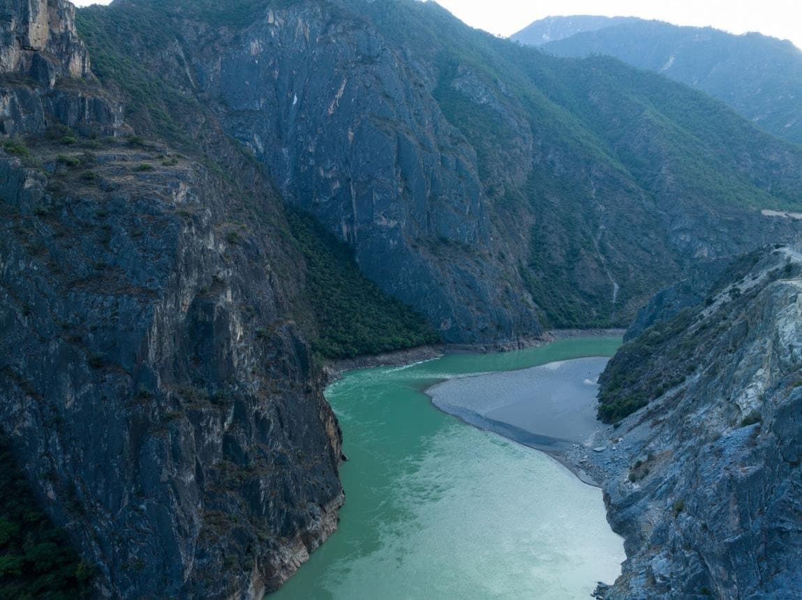 Nature and Wildlife of Yunnan — a river cutting through a steep mountain gorge