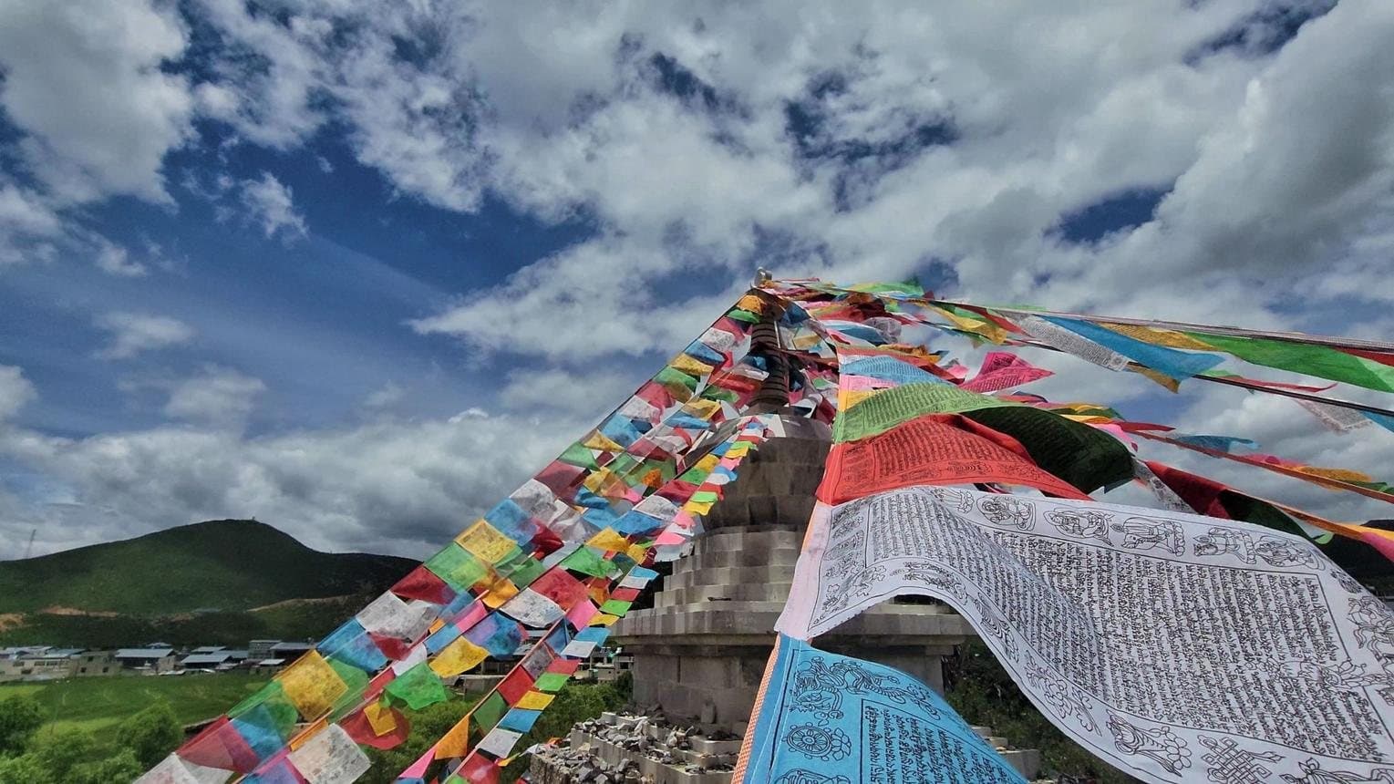 Fascinating Facts About Yunnan — prayer flags stretched across the Tibetan plateau
