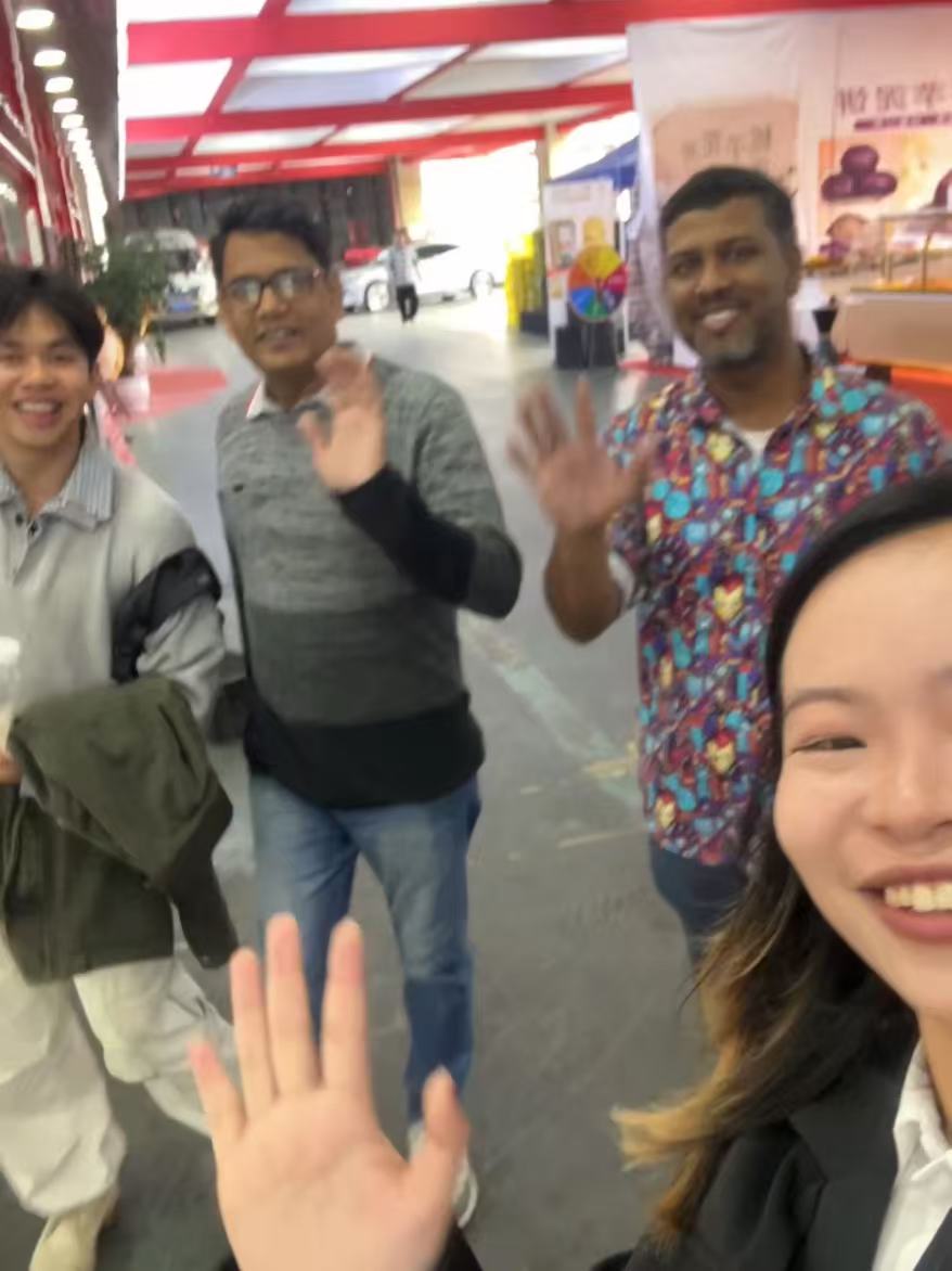 Travelers waving during a Yunnan transfer