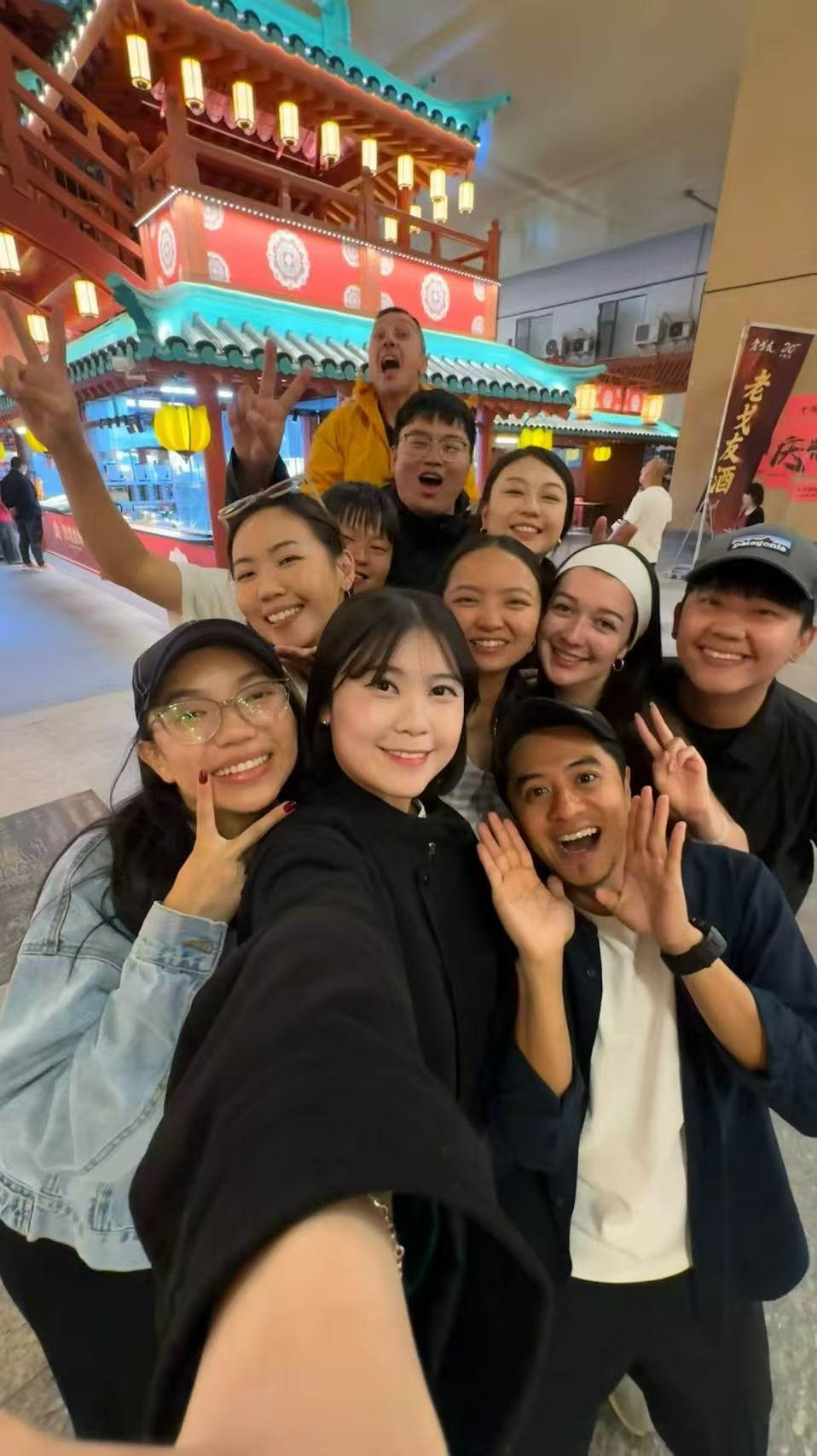 Travelers taking a night selfie in Yunnan